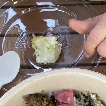 CAVA - An entire butt of lettuce was in our bowl. Gross!!!! - Mediterranean Near Me - Austin, Texas