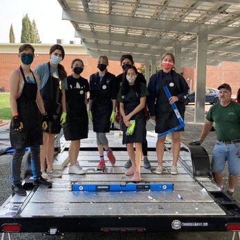 Mill Creek Builders - Sean and our students after insulating the foundation of the trailer. - General Contractors Near Me - Martinez, California Mill Creek Builders - Sean and our students after insulating the foundation of the trailer. - General Contractors Near Me - Martinez, California