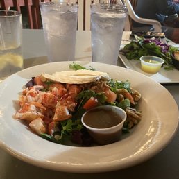 a plate of food and a glass of water a plate of food and a glass of water