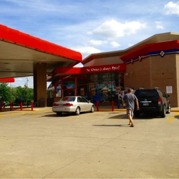 Sheetz - a man walking in front of a gas station - Convenience Stores Near Me - STOW, Ohio