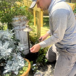 Clean Cut Landscape Co. - Our team installing landscape lighting