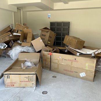 Junk Removal Mb - Boxes in my garage - Junk Removal & Hauling Near Me
