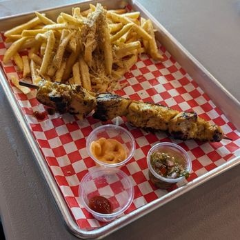 Doctor Pinchos - Pincho de Pollo / Chicken Pincho and Papas Fritas con Parmesano y Trufa / Parmesan Truffle Fries - Food Trucks Near Me - Orlando, Florida Doctor Pinchos - Pincho de Pollo / Chicken Pincho and Papas Fritas con Parmesano y Trufa / Parmesan Truffle Fries - Food Trucks Near Me - Orlando, Florida