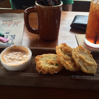 Whiskey Cake - Fried green tomatoes and houses cured jerky in the coffee mug. - New American Near Me - Plano, Texas Whiskey Cake - Fried green tomatoes and houses cured jerky in the coffee mug. - New American Near Me - Plano, Texas