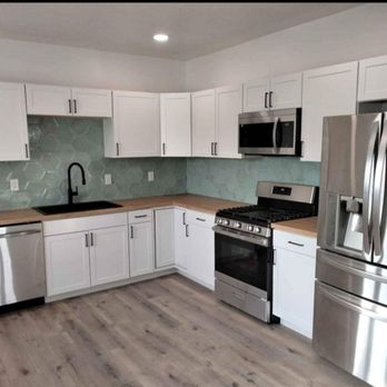 J&C Moreno - a kitchen with stainless steel appliances - Kitchen & Bath Near Me - Provo, Utah J&C Moreno - a kitchen with stainless steel appliances - Kitchen & Bath Near Me - Provo, Utah