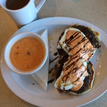 Wild Eggs - Wild benny - with buffalo chicken grits. Mushroom patty under the eggs is fantastic! - Breakfast & Brunch Near Me - Fishers, Indiana Wild Eggs - Wild benny - with buffalo chicken grits. Mushroom patty under the eggs is fantastic! - Breakfast & Brunch Near Me - Fishers, Indiana