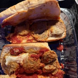 This is my $16 meatball sub with three meatballs sliced in half with little sauce and cheese. This is my $16 meatball sub with three meatballs sliced in half with little sauce and cheese.
