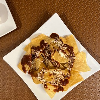 Casa Oaxaca - Mole with chips is served while waiting for the main dish. Super yummy! - Mexican Near Me - Santa Ana, California Casa Oaxaca - Mole with chips is served while waiting for the main dish. Super yummy! - Mexican Near Me - Santa Ana, California