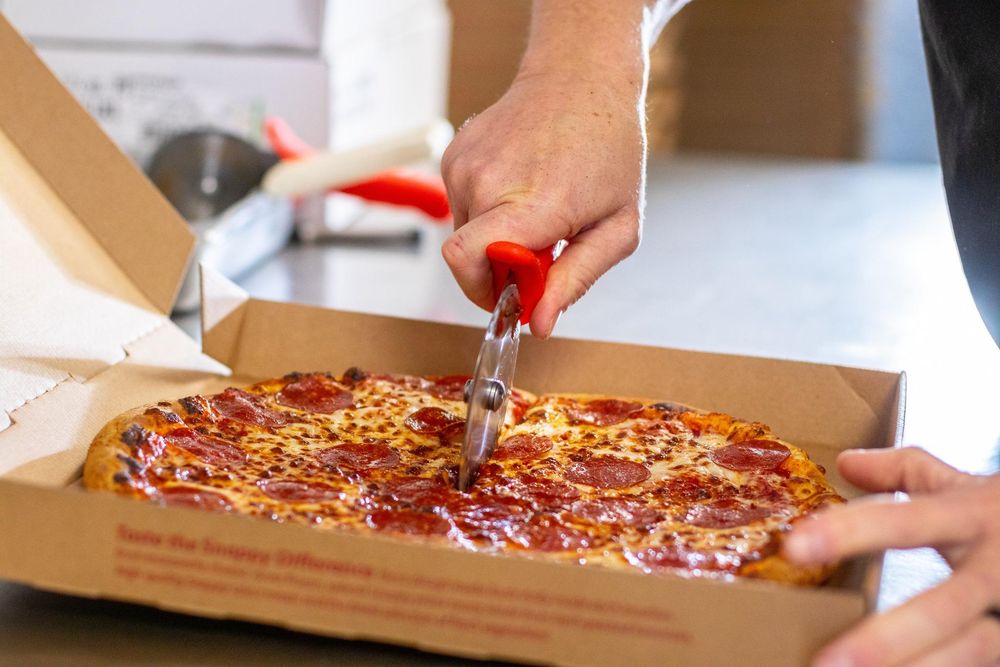 Snappy Tomato Pizza Logo
