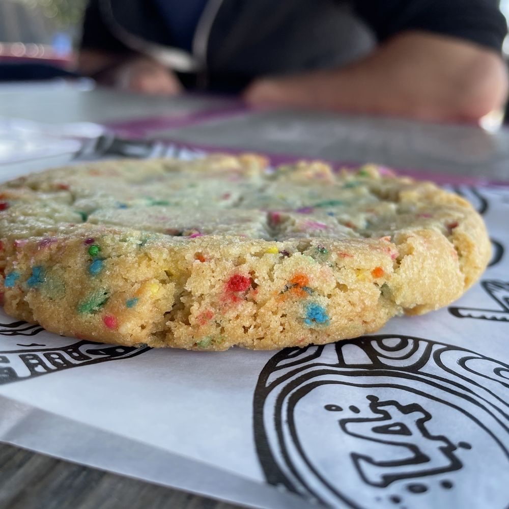 The sprinkles cookie was delicious. The sprinkles cookie was delicious.