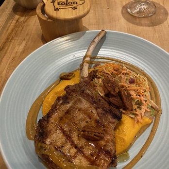 Tolon - Pork chop - New American Near Me - Fort Wayne, Indiana Tolon - Pork chop - New American Near Me - Fort Wayne, Indiana