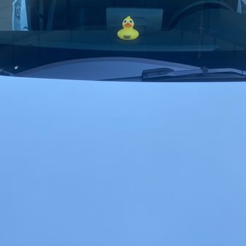 Quick Quack Car Wash - Clean white car, with a quick quack duck from Hayward's location - Car Wash Near Me - Anderson, California