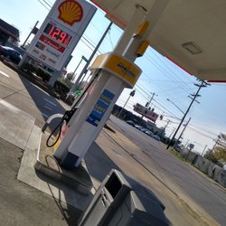 Shell - Gas pumps & corner sign @shell @yelpcincy #coronavirus #pandemic #lowgasprice #notmanycustomers #sunny&coolday #almostfriday