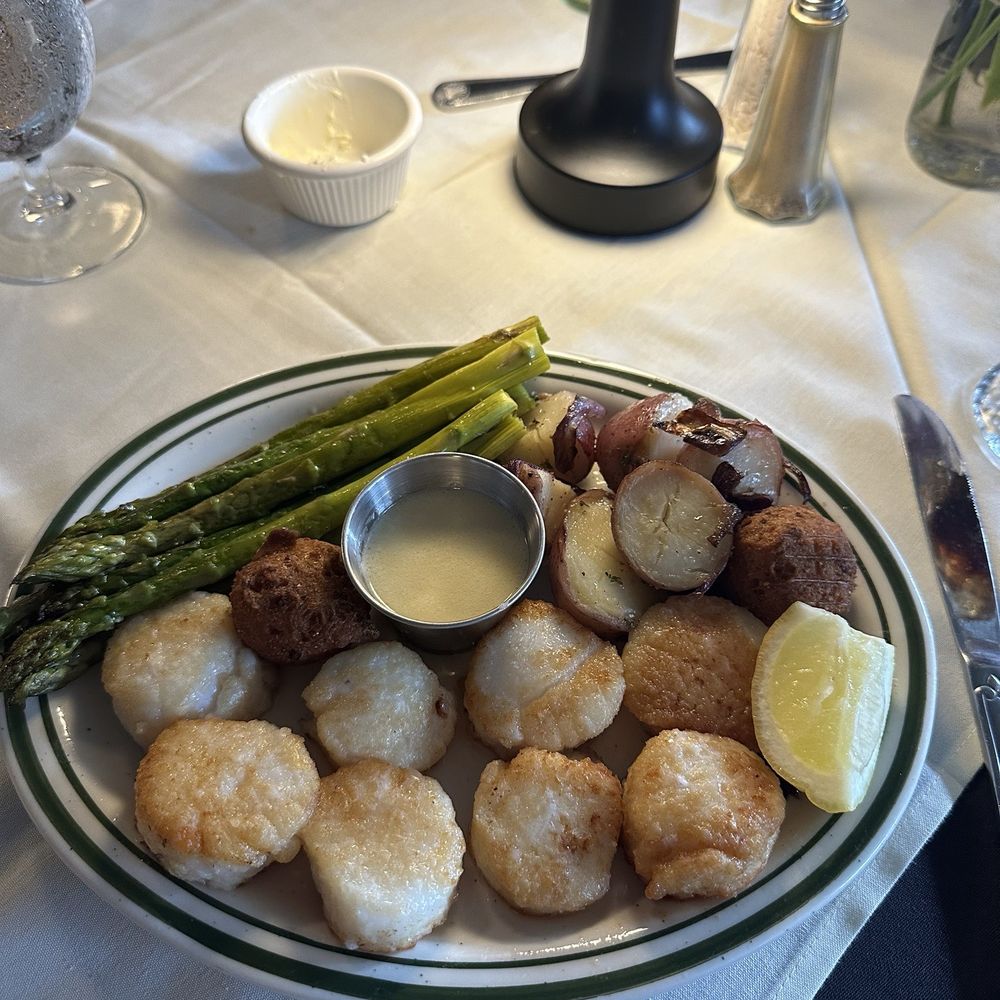 Pan-seared sea scallops, asparagus, and chef's potatoes