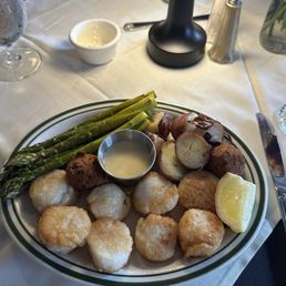 Pan-seared sea scallops, asparagus, and chef's potatoes Pan-seared sea scallops, asparagus, and chef's potatoes