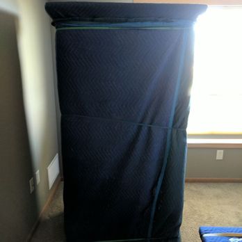 Pitbull Movers - A large armoire ready to go. - Movers Near Me - Rothschild, Wisconsin Pitbull Movers - A large armoire ready to go. - Movers Near Me - Rothschild, Wisconsin