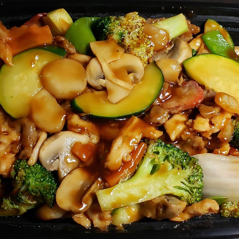 Triple Delight: vegetables with your choice of protein in a thin, subtly savory brown broth. Triple Delight: vegetables with your choice of protein in a thin, subtly savory brown broth.
