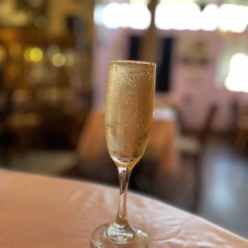 Tyme For Tea & Co - Full glass of peach champagne - Venues & Event Spaces Near Me - Fremont, California Tyme For Tea & Co - Full glass of peach champagne - Venues & Event Spaces Near Me - Fremont, California