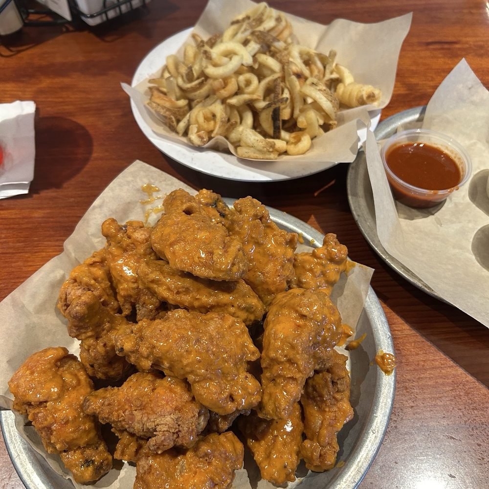 Hooters - Wings (not very saucy) and fries. - Sports Bars Near Me - Fredericksburg, Virginia Hooters - Wings (not very saucy) and fries. - Sports Bars Near Me - Fredericksburg, Virginia