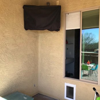 Phil Will fix It - Doggie door from the outside and the tv he mounted. - Handyman Near Me - Phoenix, Arizona