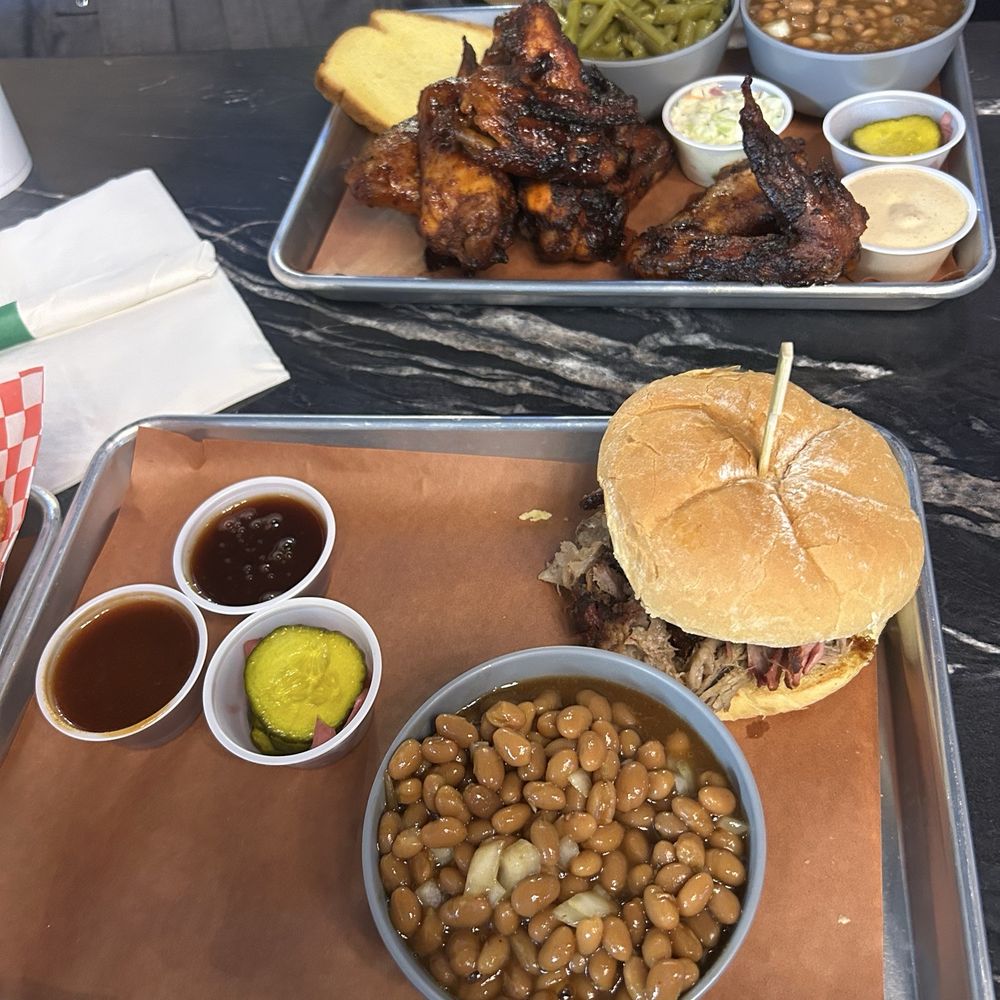 BBQ Pork Sandwich with baked beans and the Smoked Chicken Wings with baked beans and green beans