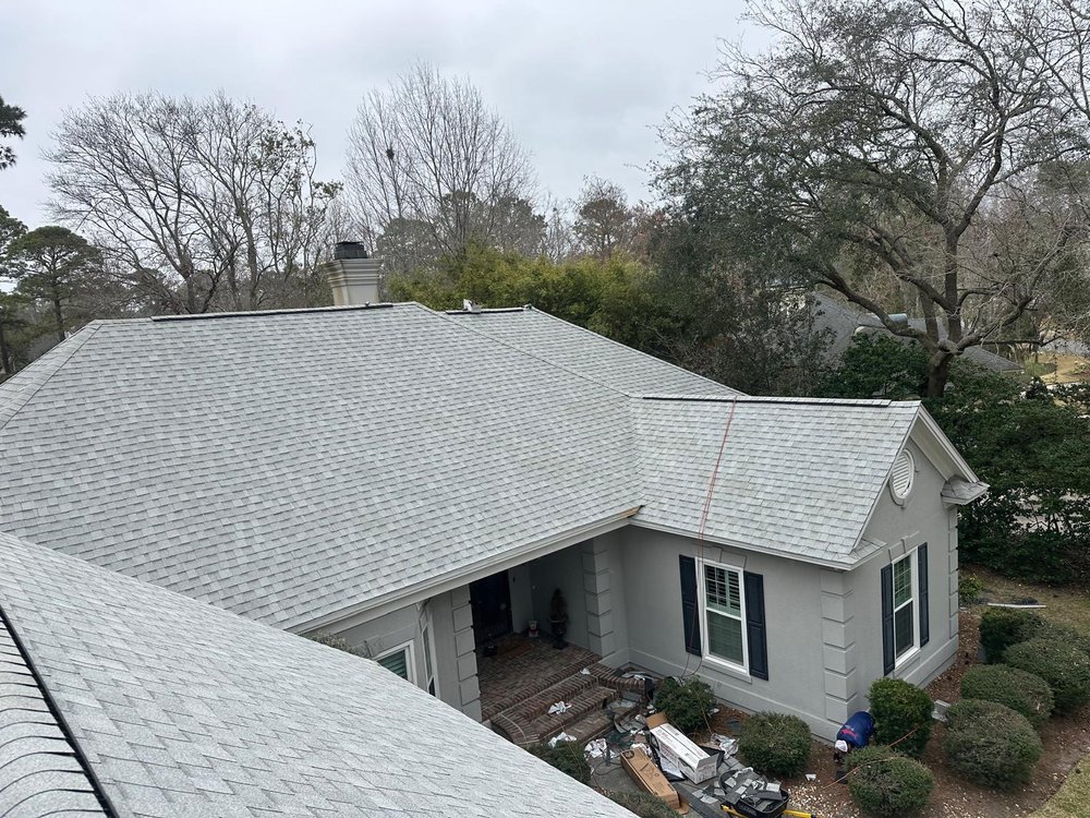 Slide of Palma's Roofing Experts