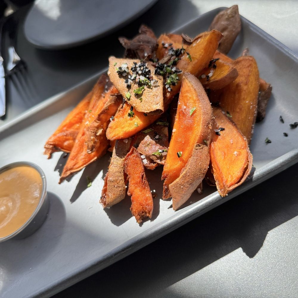 Postino Uptown Park - SWEET POTATO WEDGES - Wine Bars Near Me - Houston, Texas Postino Uptown Park - SWEET POTATO WEDGES - Wine Bars Near Me - Houston, Texas