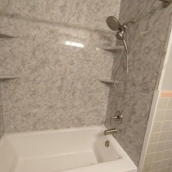 Bath R Us - a bathtub and shower in a bathroom - General Contractors Near Me - Hilliard, Ohio