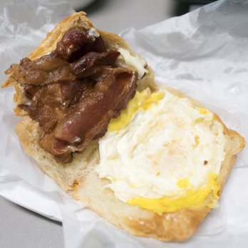 S-H Donuts - Bacon, fried egg, and cheese breakfast croissant - Breakfast & Brunch Near Me - Austin, Texas S-H Donuts - Bacon, fried egg, and cheese breakfast croissant - Breakfast & Brunch Near Me - Austin, Texas