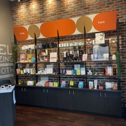 Waxing The City - Our product wall features aftercare essentials to keep your skin smooth and healthy.