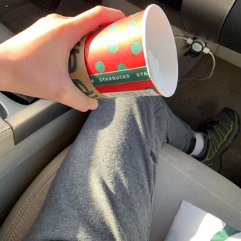 Starbucks - Less than half full venti cup of milk with more than half full whipped cream. - Coffee & Tea Near Me - San Ramon, California
