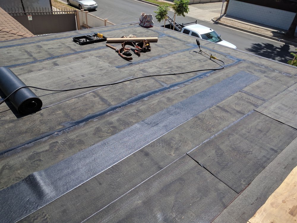 Slide of Delcid Roofing