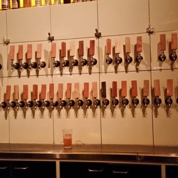 Bodega - A wall full of options!! - New American Near Me - Columbus, Ohio