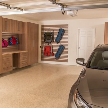 Garage Experts - a car in the garage - Flooring Near Me Garage Experts - a car in the garage - Flooring Near Me