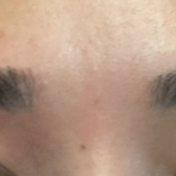 Brow Threading Studio - Eyebrow on left is threaded and eyebrow on right has not. Honestly photo doesn't show the night and day difference, but trust me it's there! - Threading Services Near Me - San Jose, California