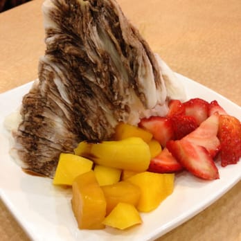 Nu Cafe - Vanilla shaved ice with mango, strawberries, and chocolate drizzle back in March 2014 - Ice Cream & Frozen Yogurt Near Me - Houston, Texas Nu Cafe - Vanilla shaved ice with mango, strawberries, and chocolate drizzle back in March 2014 - Ice Cream & Frozen Yogurt Near Me - Houston, Texas
