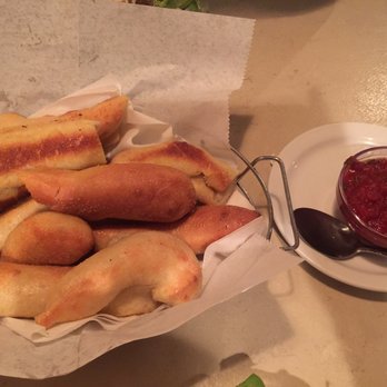 Tomato Brothers - Breadsticks with marinara sauce - Italian Near Me - Howell, Michigan Tomato Brothers - Breadsticks with marinara sauce - Italian Near Me - Howell, Michigan