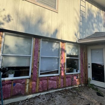 Austin Pro Siding, Windows & Roofing - Tear down old siding - Windows Installation Near Me - Austin, Texas