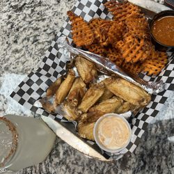 El Regio Wing Bar - Ranch water and plain wings with sweet potato fries
