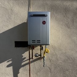 Willis Brothers Plumbing And Restoration - Rheem exterior tankless water heater installation