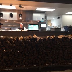 West Alley BBQ and Smokehouse - I just stumbled into this place next to Puro Cigar Bar. I bought a half rack of pork ribs to go. We'll see how good it is..,