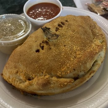 Raphael's Pizzaria & Restaurant - Supreme calzone - Italian Near Me - Winchester, Tennessee Raphael's Pizzaria & Restaurant - Supreme calzone - Italian Near Me - Winchester, Tennessee