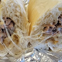 Hoagie Shop - Inside view of a delicious steak sandwich.