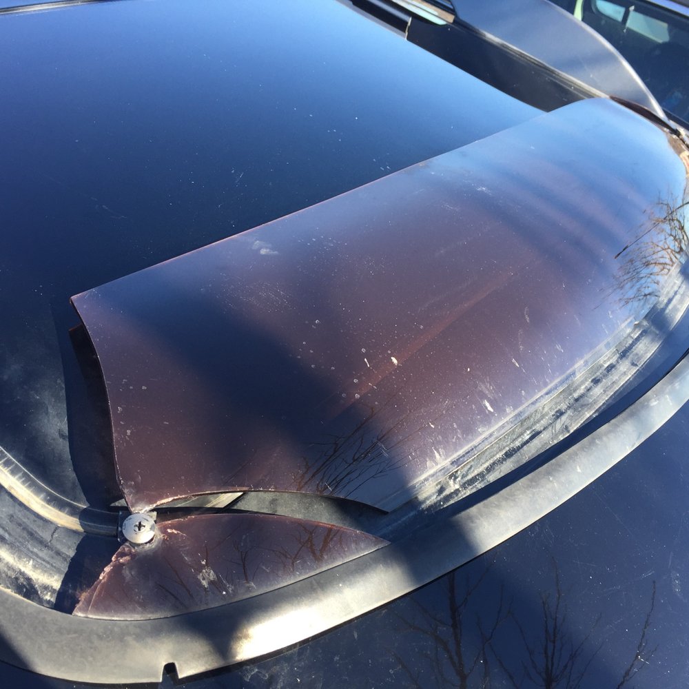 Tore our factory wind visor off of our car. Tore our factory wind visor off of our car.