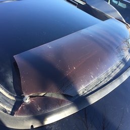 Tore our factory wind visor off of our car. Tore our factory wind visor off of our car.