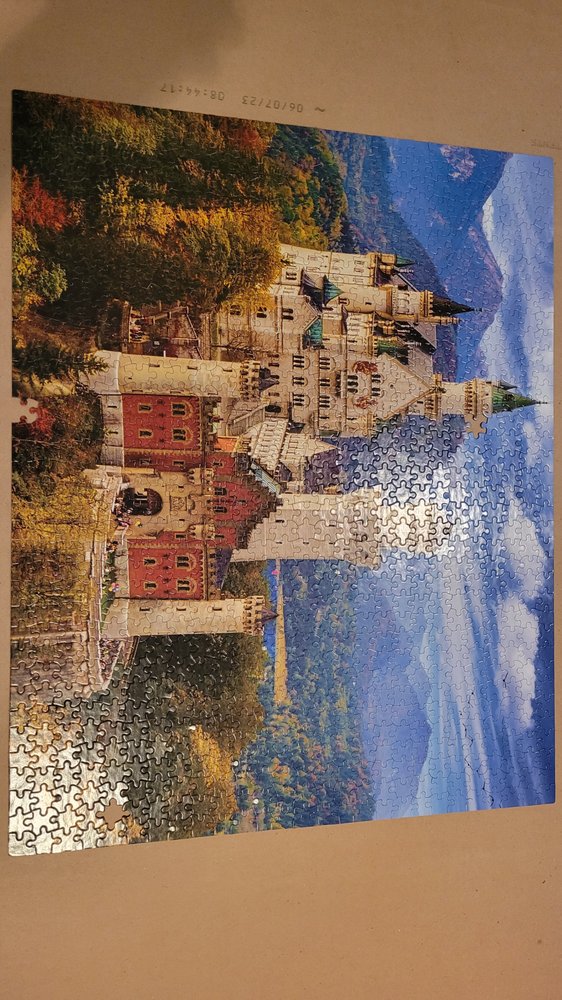 White Mountain Puzzles Logo