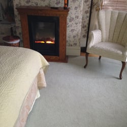 Pillsbury House - Cozy fire in our guest room.