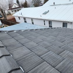 C S Quality Roofing & Gutter - West side of house gaps w snow in them. Note gap at top of peak
