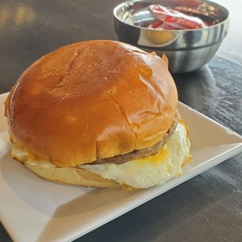 Juany's Cafe & Grill - Breakfast Sandwich (Ham, egg, American Cheese, on a toasted brioche bun) - Breakfast & Brunch Near Me - Fair Lawn, New Jersey Juany's Cafe & Grill - Breakfast Sandwich (Ham, egg, American Cheese, on a toasted brioche bun) - Breakfast & Brunch Near Me - Fair Lawn, New Jersey