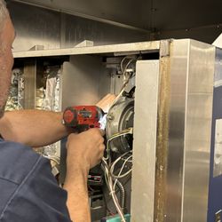 AngelSky Appliance Repair - Changing the igniter on a commercial heavy-duty oven
